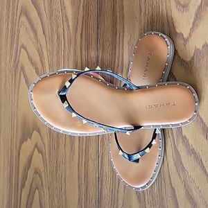 Black studded flip flops